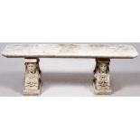 CARVED STONE GARDEN BENCH, L 60", H 19"Ex estate John Griffin. Male bust supports. Ca. early 20th