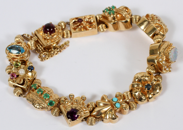 14KT YELLOW GOLD SLIDE BRACELET WITH GEM STONES L 7''Emerald, garnet, opal and topaz stones; TW.33.7 - Image 2 of 2