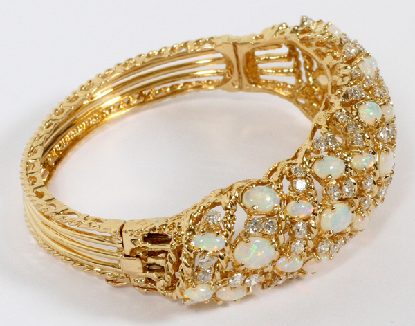 8.00CT NATURAL OPALS & 3.50CT DIAMONDS BANGLE BRACELET, W 2 7/8"A 14kt yellow gold bangle set with - Image 2 of 2