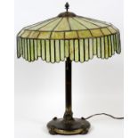 AMERICAN LEADED SLAG & TEXTURED GLASS & BRASS TABLE LAMP, C. 1920, H 20", DIA 16 1/2"A round shade