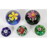 GLASS PAPERWEIGHTS, 5 PCS., DIA 2"-3"Including 1 having a fuchsia flower by Lundberg Glass Art,