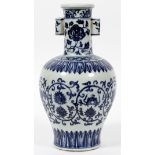 CHINESE BLUE AND WHITE PORCELAIN URN, H 13", DIA 7"Flower and feather design, double handles.- For