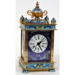 CHINESE ENAMEL CARRIAGE CLOCK H 8"Width 3 3/4". Enamel portraits in oval reserves on side panels.