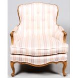 FRENCH PROVINCIAL STYLE, UPHOLSTERED WALNUT, ARM CHAIRFrench Provincial style walnut arm chair