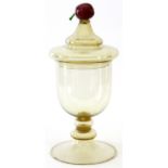 VENETIAN GLASS COVERED URN, H 13 1/2", DIA 6 1/4"Having a fruit form finial on top of lid. On a