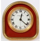 CARTIER TRAVEL CLOCK, H 3", 7504-01725In a red leather case. Along with Paris receipt.Excellent