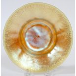 L. C. TIFFANY GOLD FAVRILE GLASS FOOTED BOWL, H 2.5", DIA 7.75"A round glass bowl with a gently
