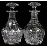 STUART CUT GLASS BOTTLES, TWO, H 6 1/2"Each is similarly cut with spear and diamond motifs, and is