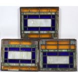 LEADED AND STAINED GLASS WINDOWS, THREE, H 20.25", L 23.5"Three matching leaded and stained