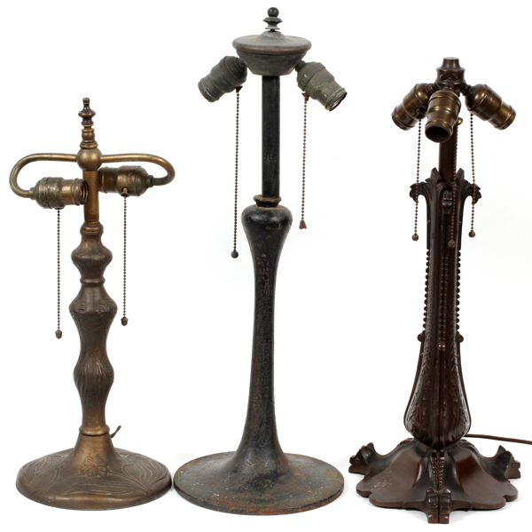 PATINATED METAL LAMP BASES, C. 1920, THREE, H 19"-22"One lamp with number 1358 molded in the base;