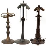 PATINATED METAL LAMP BASES, C. 1920, THREE, H 19"-22"One lamp with number 1358 molded in the base;