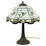 AMERICAN GLASS & PATINATED METAL TABLE LAMP, C. 1920, H 21", W 14"A hexagonal shade of bell-form,