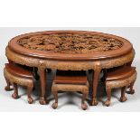 CARVED TEAKWOOD COFFEE TABLE & STOOLS, 7 PIECES, H 21", W 48", D 29"Having an oval glass top