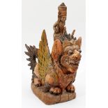 ANTIQUE POLYCHROME & CARVED WOOD FIGURE ATOP A FU LION, H 18", L 18"From the estate of Barbara K.