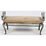WROUGHT IRON BENCH, H 26", L 48" D 20"Having curved legs and an upholstered seat cushion.The seat is