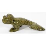 INUIT CARVED STONE FIGURE, L 5", MALE SEA SPIRITInuit carved stone figure depicting a male sea