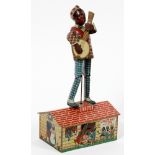 JAZZBO JIM METAL WIND-UP TOY, H 10", L 5", D 3.5" "THE DANCER ON THE ROOF"Marked Jazzbo-Jim "The