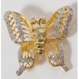 18KT GOLD AND DIAMOND BUTTERFLY PIN, W 1 1/4"A butterfly form pin of 18kt yellow gold filigree,