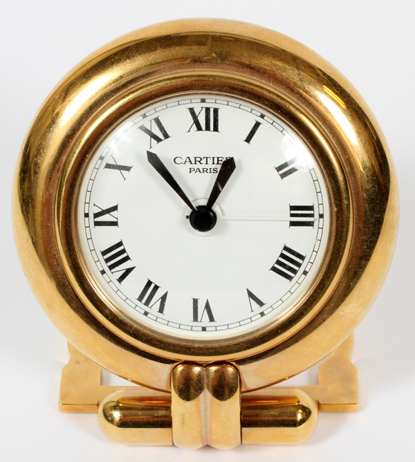 CARTIER TRAVEL CLOCK, L 3 3/4"Cartier travel clock in the shape of a large pocket watch. Having a