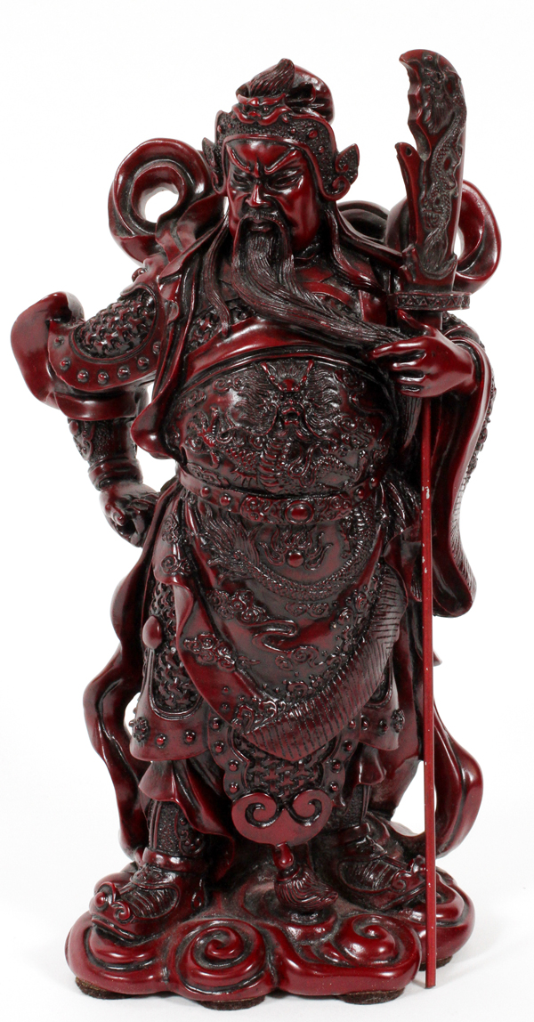 CHINESE CARVED CINNABAR WARRIOR, H 10", L 5 1/2"Full costume and wearing armor, holding a lance.