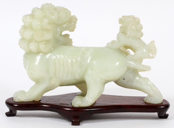 CHINESE, JADE FU LION WITH CUB, H 5", L 8"Depicts a foo lion with cub mounted on it's back. Teakwood - Image 2 of 2