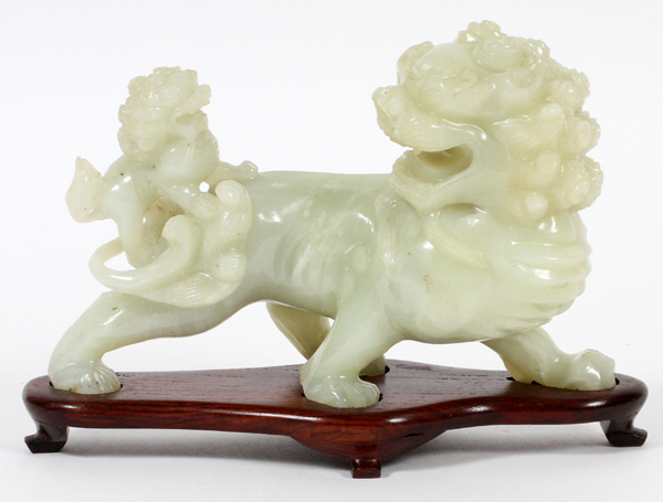 CHINESE, JADE FU LION WITH CUB, H 5", L 8"Depicts a foo lion with cub mounted on it's back. Teakwood