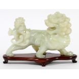 CHINESE, JADE FU LION WITH CUB, H 5", L 8"Depicts a foo lion with cub mounted on it's back. Teakwood