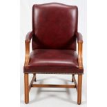 FEDERAL STYLE LEATHER & MAHOGANY LOLLING CHAIR, H 39", W 25", D 24"Upholstered in red leather. Not