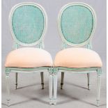 LOUIS XVI STYLE CANE BACK SIDE CHAIRS, PAIRSpring style upholstered seats. Glazed frames, hand