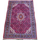 BIJAR PERSIAN RUG, 5' 1" X 3' 6"Red ground, central medallion, within multiple borders.Good