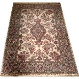 KASHMIR ORIENTAL RUG, MID-LATE 20TH C., 5' 10" X 4' 0"Ivory ground.Lightly soiled; small stains;