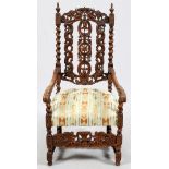 CARVED OAK ARM CHAIR CIRCA 1900 H 49"Hand carved back panel, spiral stiles, urn form finials.