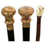 GOLD HANDLED & EBONY WALKING STICKS (2) & ANOTHER, C. 1900Including 2 with gold handles and 1 other.