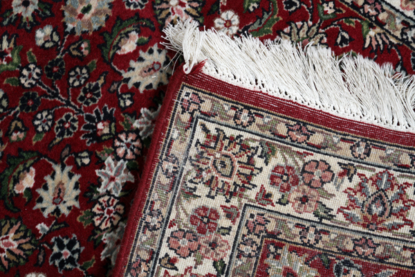 INDO HAND WOVEN MAT, W 2'7" L 4'Red field with ivory border. Hand woven, all wool.Good condition. - Image 2 of 2