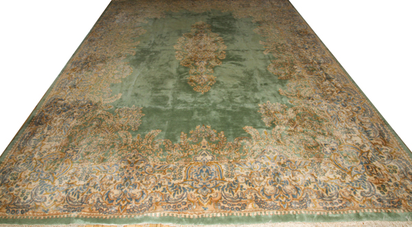 PERSIAN KERMAN WOOL CARPET, C. 1975-1985, W 11' 5", L 14' 6"Central medallion with celadon green