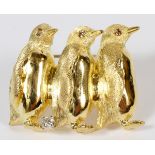 18KT GOLD PENGUIN PIN, H 1"An 18kt yellow gold penguin form pin, having 0.24ct diamond accents (.