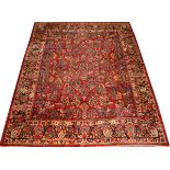 SAROUK PERSIAN HAND-WOVEN RUG, 9' 5" X 8' 1" Red ground.