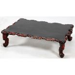 JAPANESE CARVED EBONIZED WOOD LOW TABLE, MODERN, H 13", W 32", L 47"Very slightly nicked. Rf- For