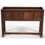 ANTIQUE HAND CARVED OAK PLANTER, C. 1850, H 30", W 43", D 14"Put together with pegs. Schlottman.
