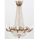 TWELVE-LIGHT BRONZE AND CRYSTAL CHANDELIER, H 48", DIA 36"Having a bronze circular framework with