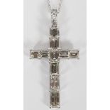 18KT GOLD AND 4.4CT DIAMOND CROSS PENDANT NECKLACE, L 26"An 18kt white gold pendant studded with 4.