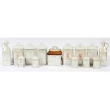 WHITE BLOCK GERMAN IRIDESCENT PORCELAIN CANISTER SET, H 6" - 12"Thirteen canisters. All having fired