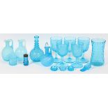 VICTORIAN BLUE GLASS TABLEWARE, 16 PIECESIncludes 3 syrup cruets, 1 barber bottle, 5 daisy water