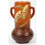 ROSEVILLE 'FREESIA', POTTERY VASE, 126/10", H 10"orange to dark brown ground, double handle.light