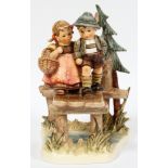 HUMMEL PORCELAIN FIGURINE, H 8.5", "ON OUR WAY"Hummel figurine "On Our Way" # 865. Accompanied by