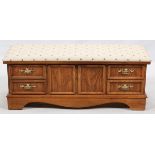 LANE CEDAR HOPE CHEST, H 18", W 48", D 16"Having an upholstered top and bracket feet.In good