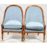 BAKER FURNITURE CO PAIR CHAIRS, WALNUT FRAMESCurved form back and arms, raised on casters, having