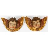 SPANISH CARVED & PAINTED WOOD ANGEL HEADS, TWO, W 9"Measures W.9" x 5 1/2".Light wear to the