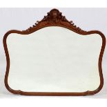 MAHOGANY CARVED AND BEVEL GLASS MIRROR, 19TH.C. 41" X 46"Circa 1860. Serpentine shaped mahogany