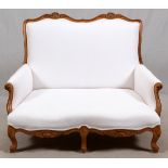 ITALIAN, CARVED FRUITWOOD SETTEE, C1950, H 38", W 48"Italian carved fruitwood settee with cream